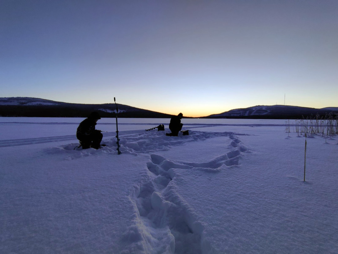Ice Fishing at Lake Pyhäjärvi by Experience Pyhä