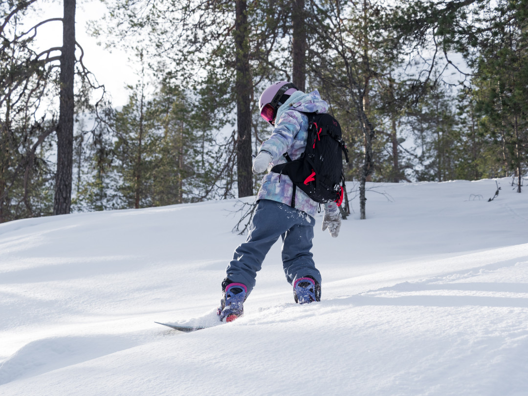 Child snowboarding at Pyhä Ski Resort 