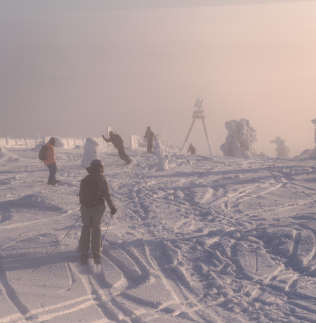 Skiers and snowboarders at Huttu freeride
