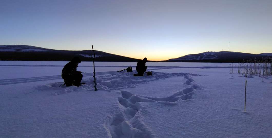 Ice Fishing at Lake Pyhäjärvi by Experience Pyhä